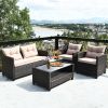 4 Pieces Outdoor Rattan Armrest Furniture Set Table with Lower Shelf - Brown